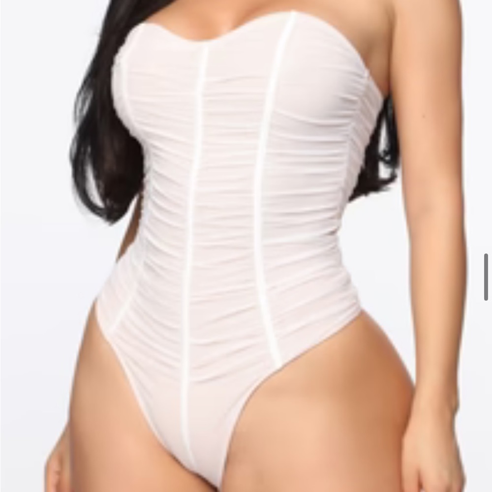 White fashion over bodysuit